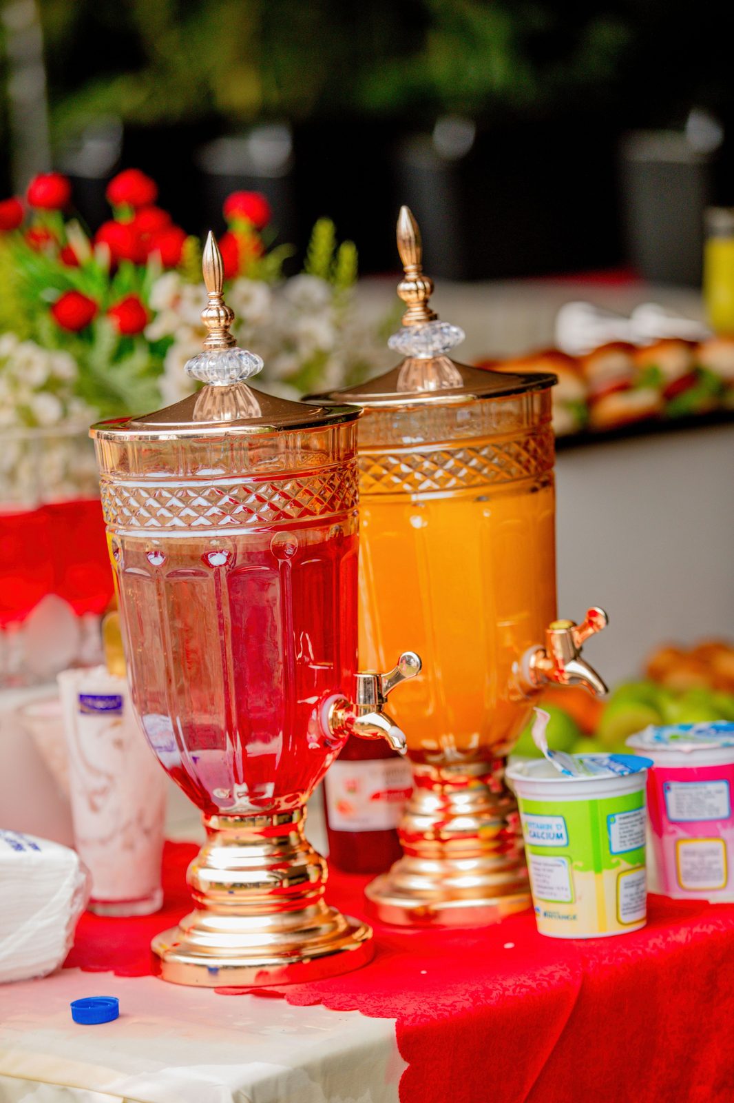 Elegant beverage dispensers with fresh fruit (stock photo)